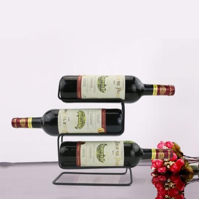 China Sustainable Simple Modern Free Standing Metal Wine Rack Simple Crafts Bar Interior Decorations Wine Display Rack for sale