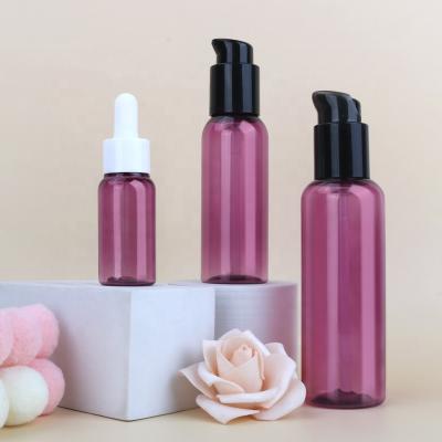 China Household Products Purple Lotion Bottles Mini Lotion Bottle 30ml 100ml Luxury Transparent Squeeze Bottle for sale