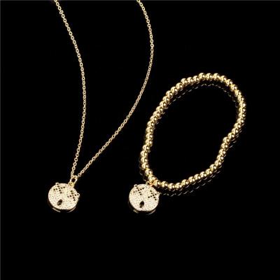 China Fashionable Cute Women Jewelry Set Cute Gold Plated Smile Face Jewelry Necklace And Bracelet Statement Gold Jewelry Sets for sale