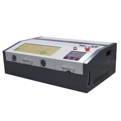 China Laser Engraving Small Automatic Laser Engraving Machine 3020 Painting Engraving Machine Leather Cutting Machine for sale