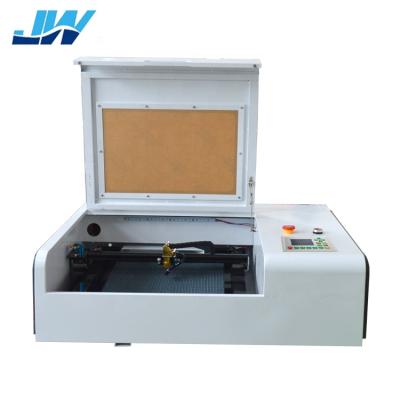 China Laser Engraving Laser Cutting Machine CO2 Laser Machine 4040 Laser Wood Rubber Machine for sale