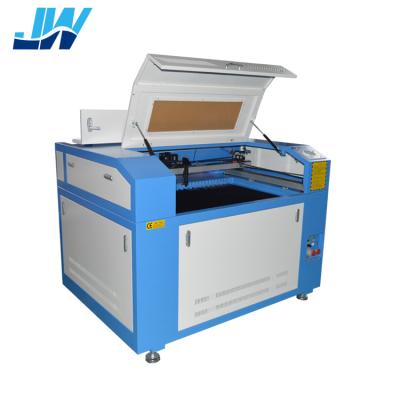 China Laser REDUCING Wei 6090 laser engraving machine price jing for fabric for sale