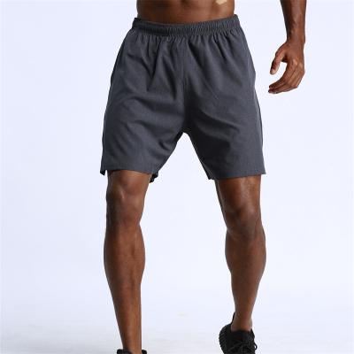 China Running Sports Wear Mens Shorts Summer Drawstring Quick Dry Breathable Joggers Men's Tennis Sport Shorts for sale