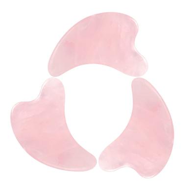 China Wholesale Face Lift Skin Firming and Relaxing Dolphin Shape Pink Crystal Stone Natural Quartz Gua Sha Facial Massage Tool for sale