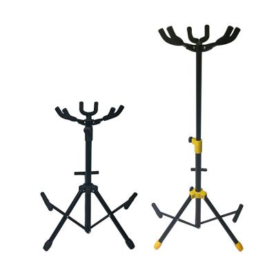 China NEW GUITAR HEBIKUO Folding Guitar Stand Triple Floor Stand for Acoustic and Electric Guitars for sale