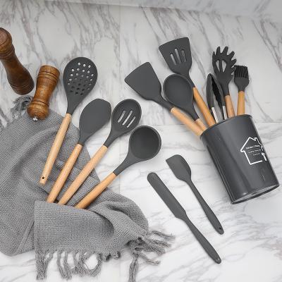 China Sustainable Silicone Set Spatula Hit Amazon Handle Cookware Stainless Steel Tools Wooden Kitchenware for sale