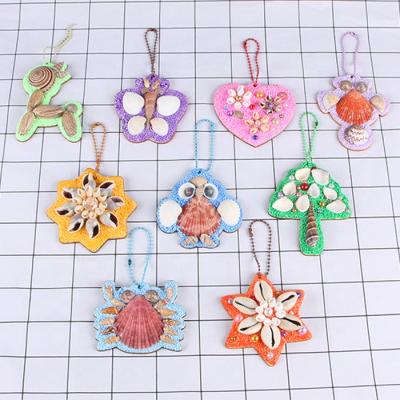 China Holiday decoration & Cartoon Handmade Pendant Shell Car Key Gift Small School Bag Creative DIY Shell Pendant Crafts for sale