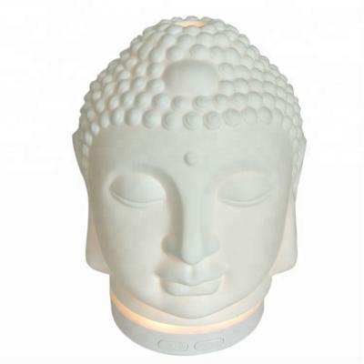 China Changeable Colors LED Light Buddha Head Shaped Stone Ceramic Porcelain Oil Diffuser for sale