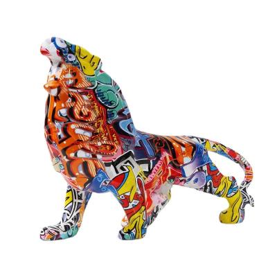 China Artificial Creative Painted Simple Graffiti Lion Art Color Decorations Home Entrance Wine Cabinet Desktop Resin Crafts for sale