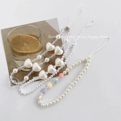 China New Creative Cartoon Acrylic White Love Acrylic Beaded Lanyard Mobile Phone Chain for sale