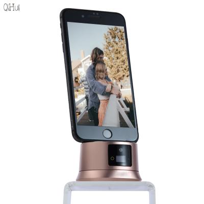 China Adjustable Face Tracking 360 Rotation Automatic Face Object Tracking Phone Holder After Robot Camera Shooting Man for sale