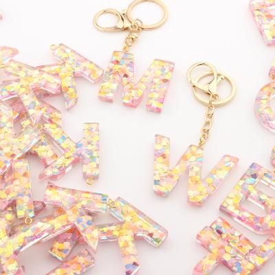 China Resin English Love Resin Letter Love Crystal Epoxy Popular Keychain Chinese Key Chain Jewelry Supplier for sale