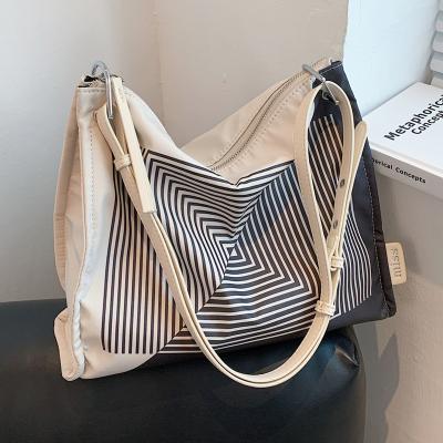 China Other Geometric Fashion Designer Swap Large Capacity Women Shoulder Handbag Leather Strap Canvas Shopping Tote Bag for sale