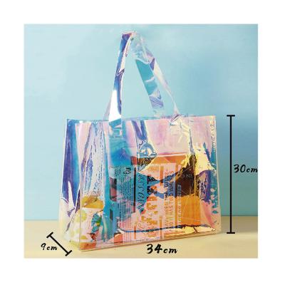 China Fashion Fashion Low Small Jelly Laser Pvc Handbag Transparent Printing Custom Moq Shopping Bag Women's Clear PVC Handbags for sale