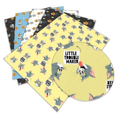 China PU Vinyl Faux Leather Waterproof PU Cartoon Character Tom and Jerry Digital Printing Faux Leather Fabric Supplies for sale