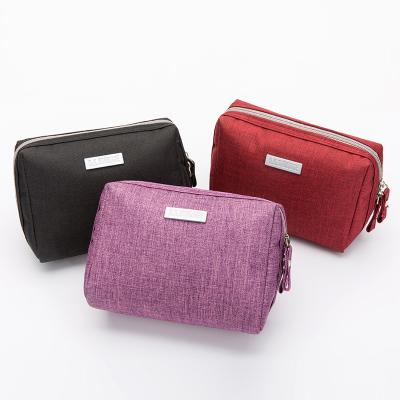 China 2022 Hot Selling Fashion Cationic Handbag Mini Cosmetic Storage Bag Washing Cosmetic Bag for sale