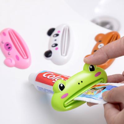 China 2022 Viable Multifunctional Kitchen Accessories Tools Cartoon Toothpaste Squeezer Useful Home Bathroom Decoration Kitchen Instruments for sale