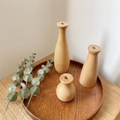 China Simple handcrafted home decoration beech handicraft small caliber dried flower wooden vase for sale