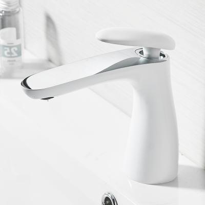 China Modern White Brass Single Basin Faucet Metered Handle Bathroom Sink Faucets Mixer Taps for sale