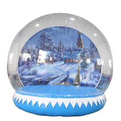 China Custom Giant Human Snow Globe Photo Booth Decoration Inflatable Size Snow Globe With Blowing Snow for sale