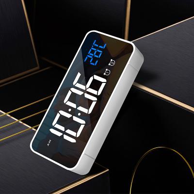 China Creative Multifunctional Customizable LUMINOVA LED Mirror Digital Alarm Clock Desk And Table Clocks Desk for sale