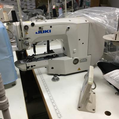 China Garment shops original used juki-1903A computerized automatic button tying sewing machine with automatic button sending for sale