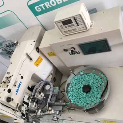 China Garment Shops Used Japan Jjuki-1900B-SS Automated Button Fastening Machine With Automatic Button Sending For Vending for sale