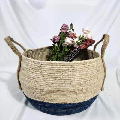 China Large Sustainable Round Straw Woven Corn Husk Toy Blanket Living Room Storage Basket for sale