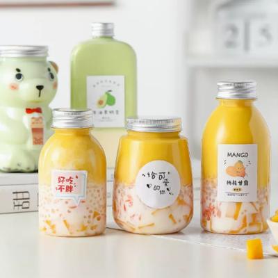 China Wholesale custom cold bubble PET cold tea milk tea boba juice tea beverage plastic round beverage bottle for sale