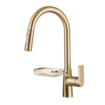 China Gold Modern New Product Brushed Brass Mixer Taps Pull Out Pull Down Kitchen Faucet With Sponge Holder for sale