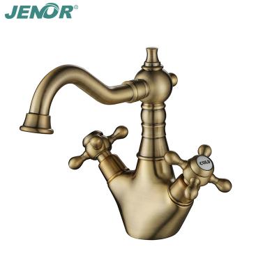 China Swivel Metered Bathroom Faucets Curved Spout Long Brushed Vintage Brass Bronze Faucet Handle Basin Sink Faucet Cold And Hot Double Water for sale