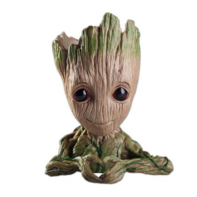 China Cartoon Toy The Galaxy Groot Toy Hand Up Model Action Figure Tree Man Flower Pot Baby Groot Pen Figure Flower Pot Guardianes Action for sale