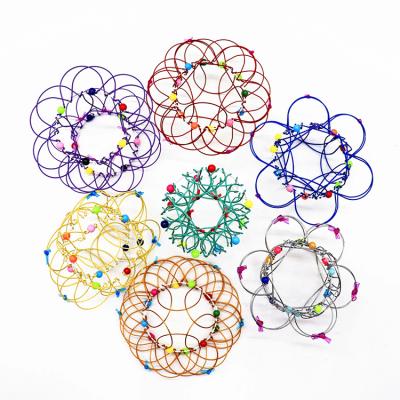 China Entertainment Toys 35 Different Shape Creative Magic Loops Flexible Flower Basket Wiggle Sensory Toys Toys Games Children Magic Ring Spring Toy 3D Flowing for sale