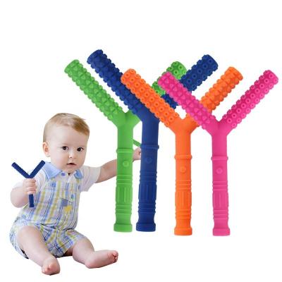 China Factory EXW Battery Operated Baby Teething Tubes Y Shape Rubbery Silicone Teether Baby Teether For 3-12 Months for sale