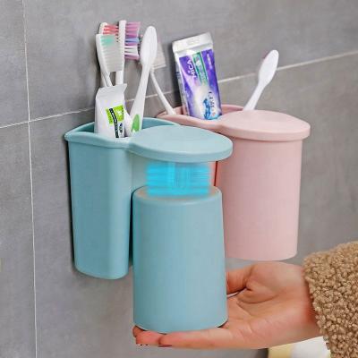 China OEM/ODM 11x5x12cm UV Wall Mounted Toothbrush Holder Porta Cepillo De Dientes Kids Plastic Viable Multifunctional Bathroom Travel Cup for sale