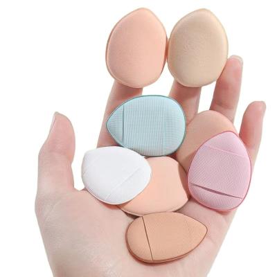 China Face Makeup Tools Wholesale Mini Cosmetic Puff Details Concealer Fingertip Small Steamed Buns Mini Finger Water Droplets Air Cushion Puff for sale