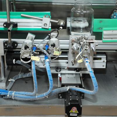 China Factory Production Automatic Candle Wick Placement Machine Inserting Wicks Equipment With Multi Pieces Wicking Machine For Glass Jars for sale