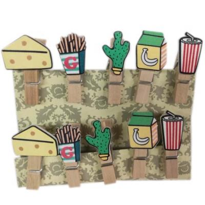 China Europe Spring Staples Natural Wooden Pegs With Snacks Designs Cola, Banana, Chips, Bisciut for sale