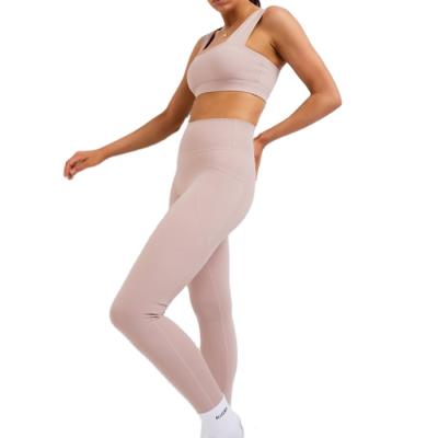 China Factory Wholesale Breathable Custom Seamless Fitness Active Bra And Seamless Active Leggings With Pouch For Women for sale