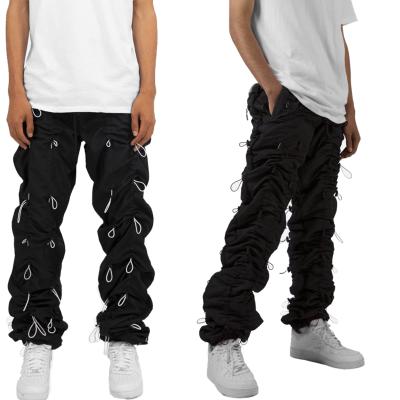 China hot new Anti-wrinkle men's fat pants stretch rope pants mesh scratch waist zipper pockets and bungee sports pants for sale