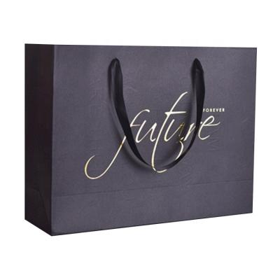 China PB-17 gold foil recyclable luxury brand logo printing eco paper bag custom paper bag preparing paper bag black matte for sale