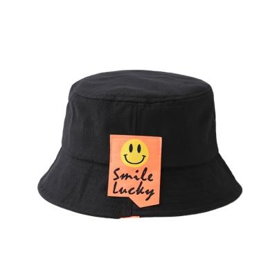 China 2021 picture children travel solid color outdoor custom beach hat smiling bucket hat for sale