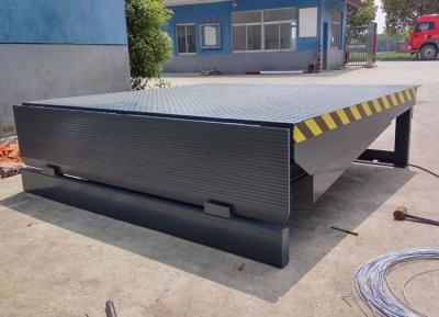 China Van het kuil-stijl het Materiaal6000kg Hydraulisch Elektrisch Dok Leveler Containerlaadperron Te koop