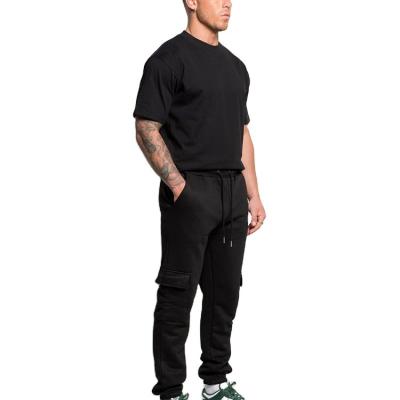 China Custom Black Pocket Workout Anti-wrinkle Sweatpants Hombre Cargo Pants Utility Jogger for sale