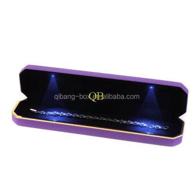 China Handcrafted luxury leather gift box with light logo diamond suede ring boxes fashional LED light custom jewelry box for sale