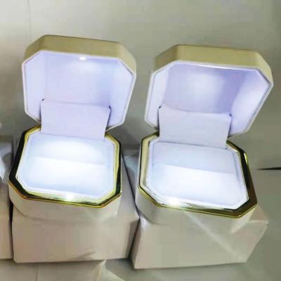 China Velvet+leather factory wholesaler luxury custom logo wedding ring pendant box with led light jewelry box for sale