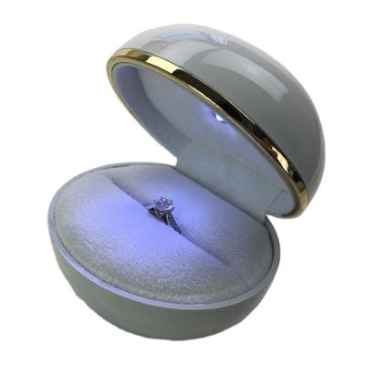 China Handmade Round Egg Sphere Shape Rubber Painted Diamond Ring Box Jewelry Packaging Box With Led Light for sale