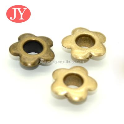 China Nickel Free Special Shape Flower Pattern Shape Grommet Brass Grommet for sale