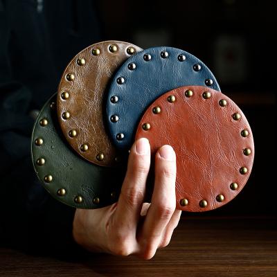 China Viable Wholesale Custom Leather Round Coasters Insulation Mats And Pads Kitchen Table Cup Coffee Tea Coasters for sale