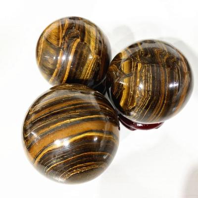 China Wholesale natural shui gemstone europe feng crystal folk crafts healing yellow tiger eye sphere crystal ball for sale